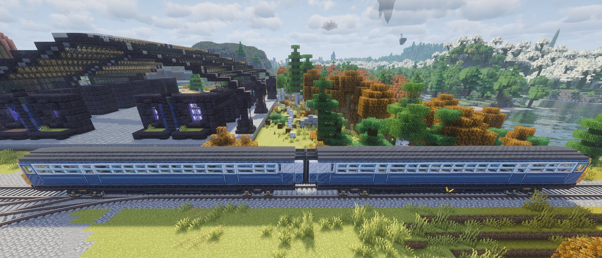 La Lynx A-220D, automotrice bleue à deux caisses, sur les voies près de la gare centrale.